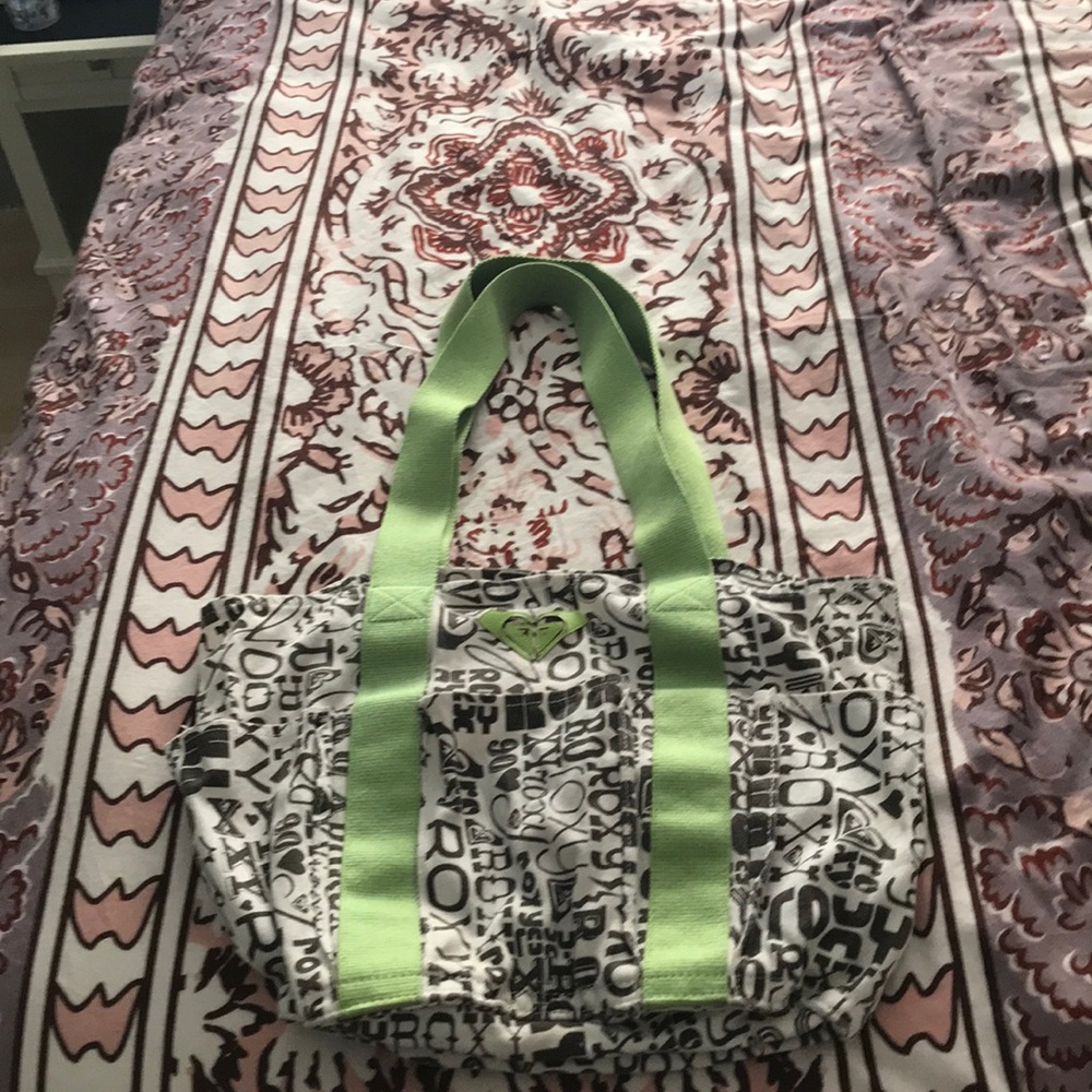 Roxy bag. Approx 12 in. Fits over the shoulder.